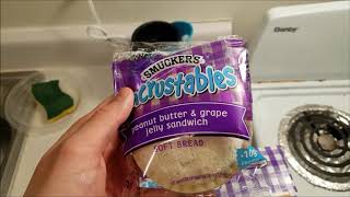 Smuckers Uncrustables Peanut Butter amp Grape Jelly Sandwich [upl. by Aicyle]