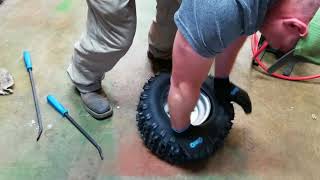 How To Mount A Mower Tire [upl. by Onaicilef]