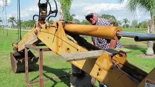 Case 580 Super L Backhoe Boom Cylinder Removal [upl. by Ennyleuqcaj]